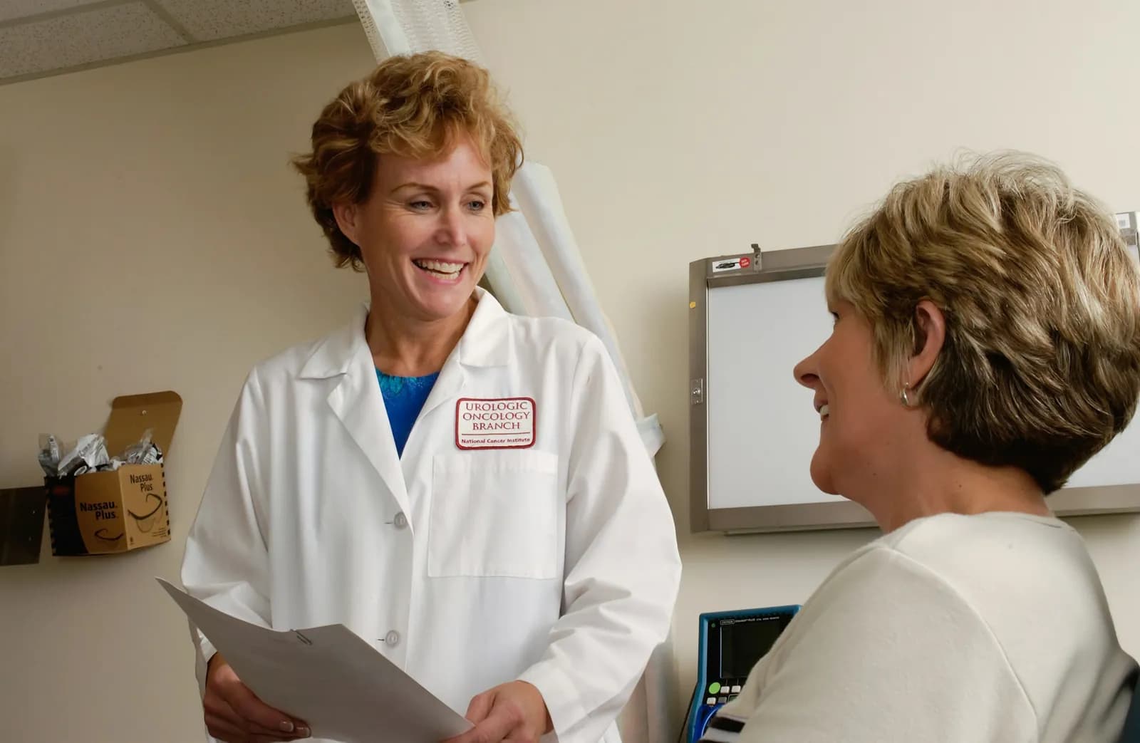 Doctor talking with an older woman during a consultation